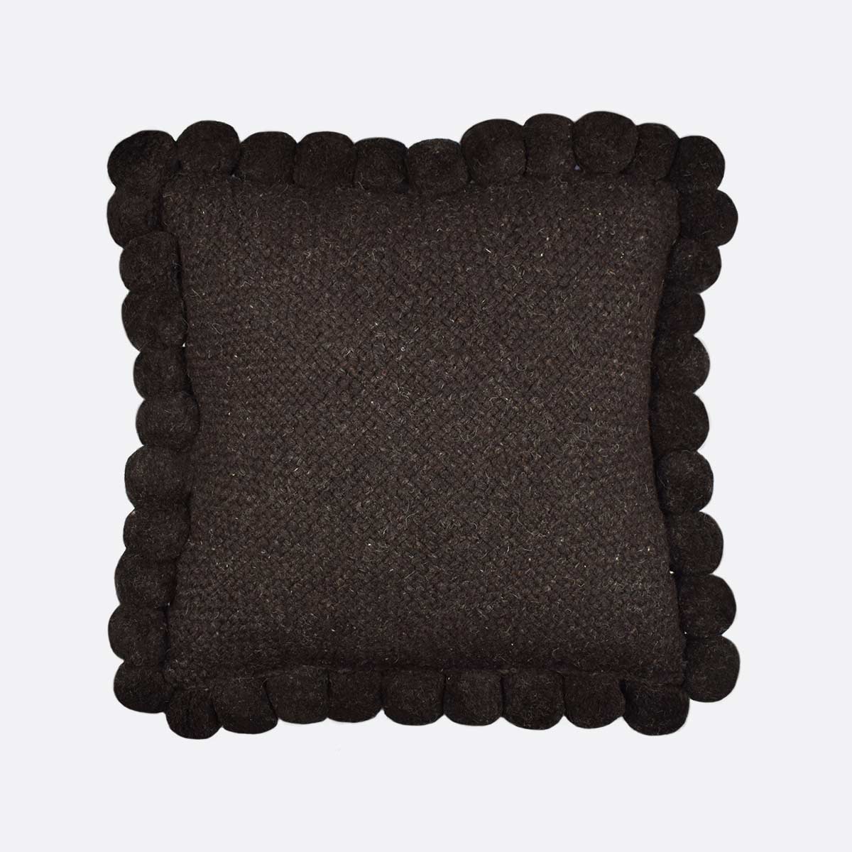 Coussin ethnique 50x50 pompons noir Finca Home