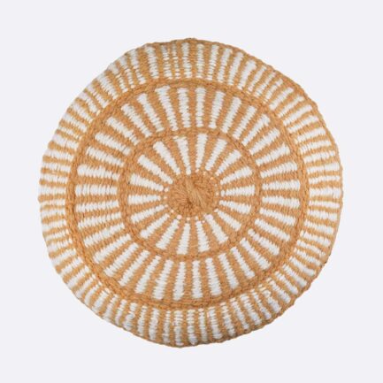 Coussin rond à motifs ocre