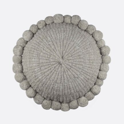 Coussin ethnique rond à pompons 50cm gris Finca Home