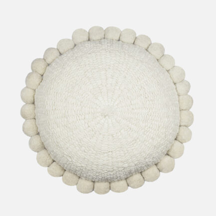 Coussin rond à pompons blanc