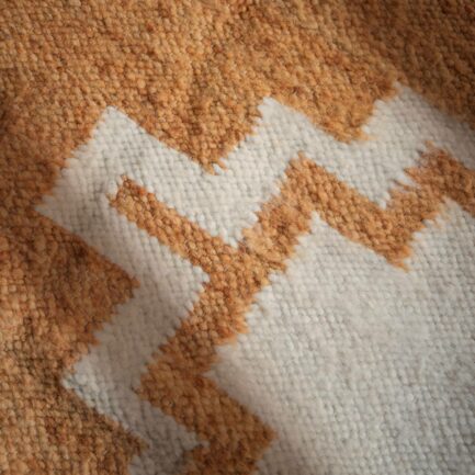 Tapis en laine ocre