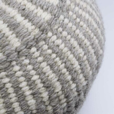 Coussin rond à motifs gris