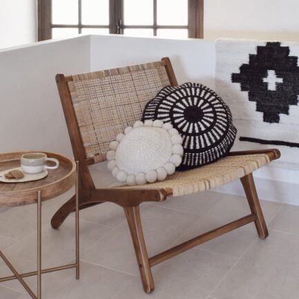 Mini coussin rond à pompons blanc