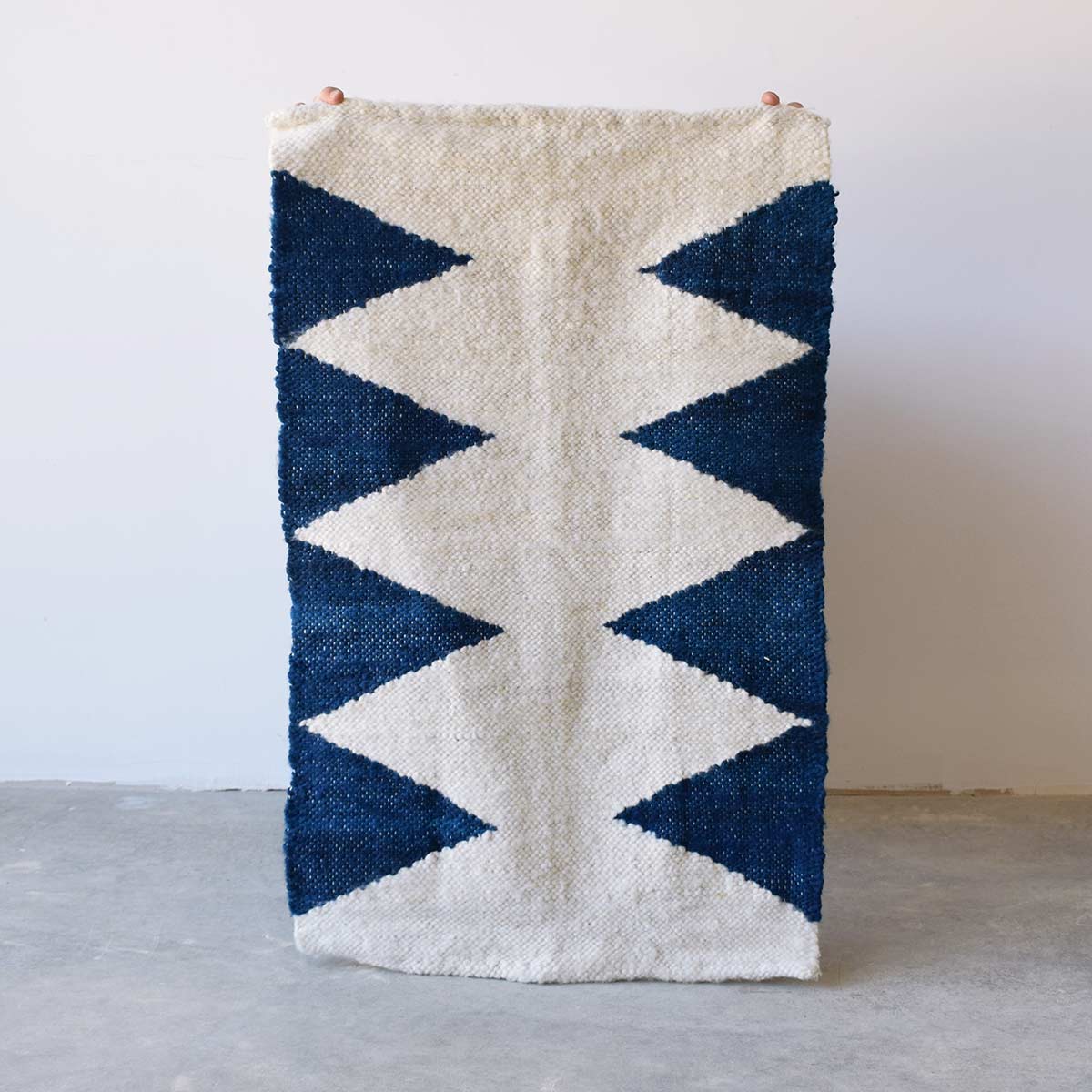 Mini tapis en laine motifs ethniques bleu Finca Home