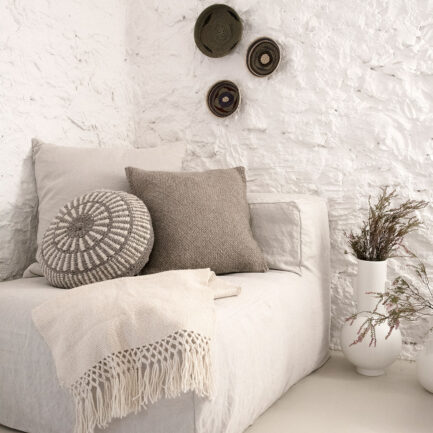 Coussin rond à motifs gris